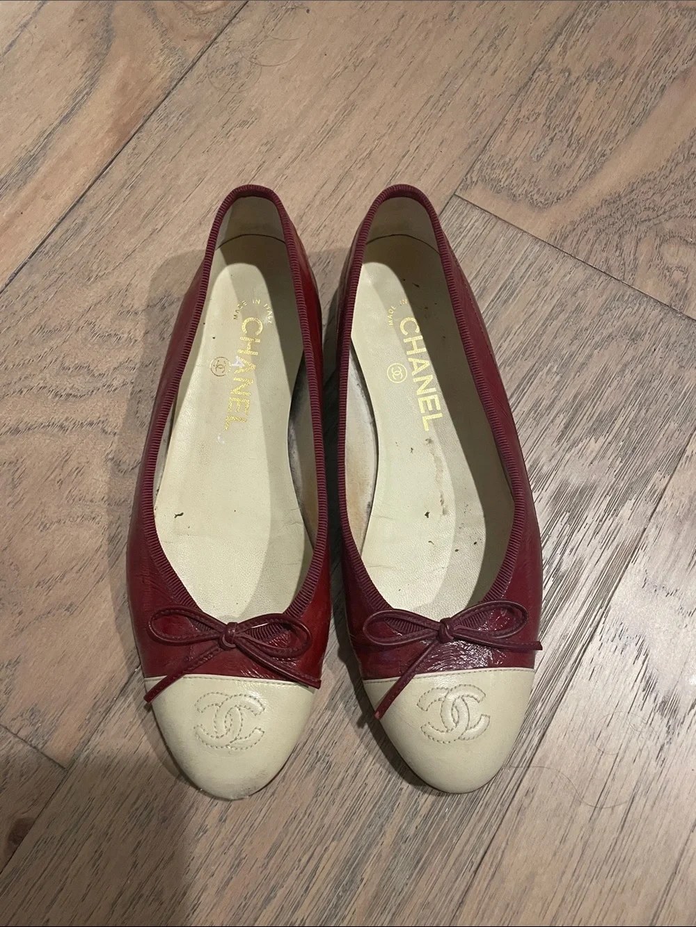 CHANEL Burgundy Eel Skin and Cream Cap-Toe Ballet Flats